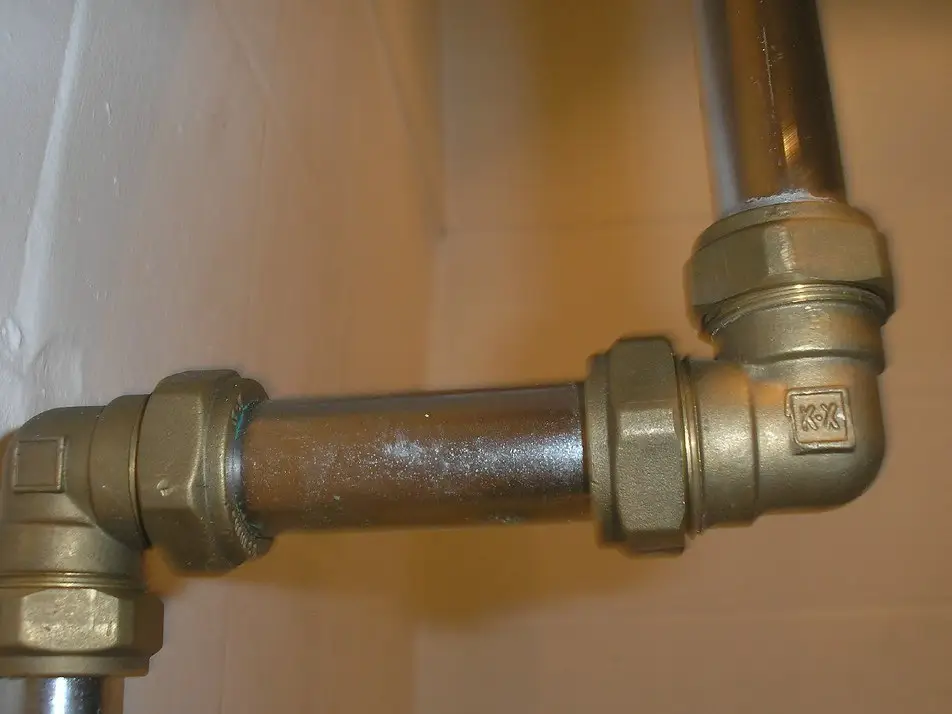 Plumbing leak — dripping water from a fixture